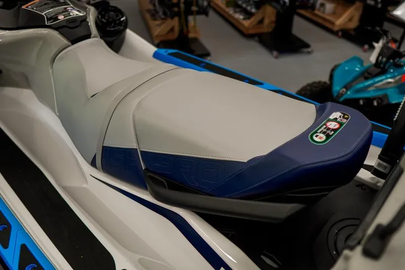 Slide: The Image of 2026 Sea-Doo FishPro Sport 170 seat detail in showroom setting. - 18