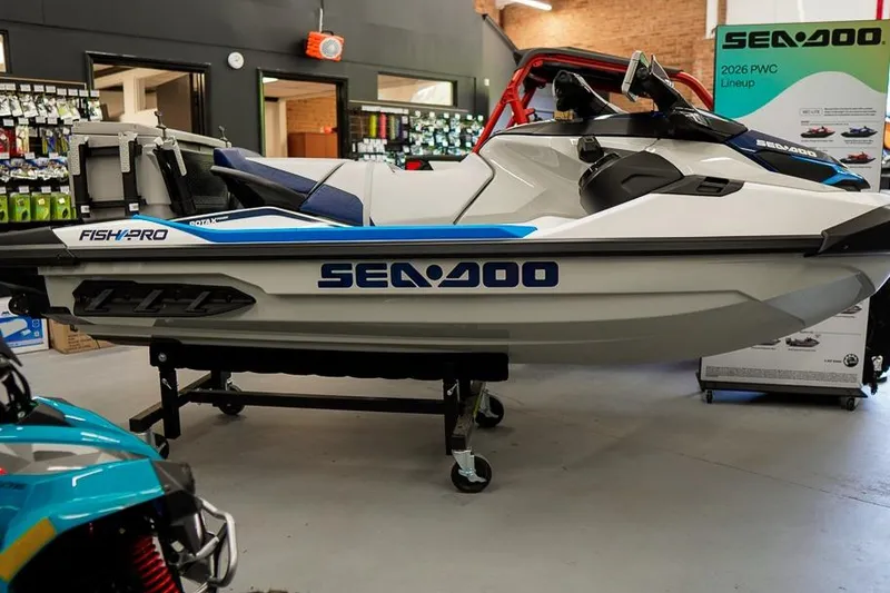 Slide: The Image of 2026 Sea-Doo FishPro Sport 170 on display in a showroom setting. - 2