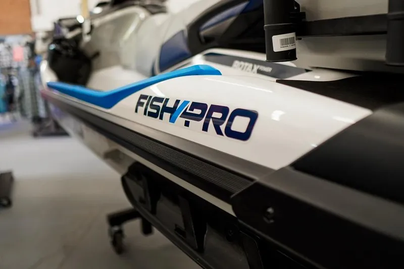 Slide: The Image of 2026 Sea-Doo FishPro Sport 170 jet ski, close-up view of branding. - 7