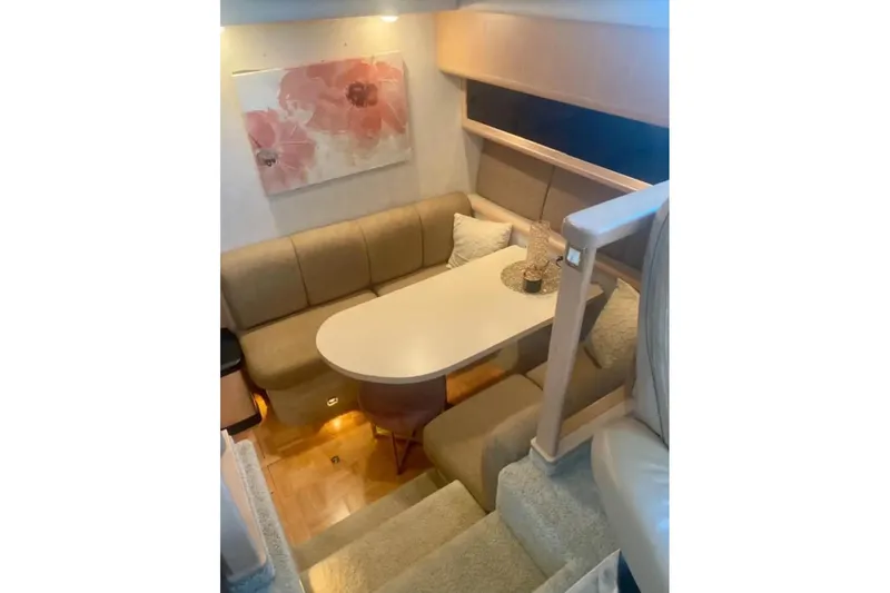 Slide: The Image of Interior of 1991 Silverton 41 Motor Yacht with cozy seating and elegant decor. - 71