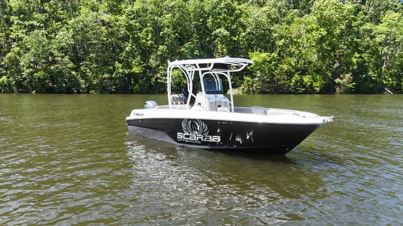 Slide: The Image of 2020 Wellcraft Scarab Offshore boat on calm water. - 20