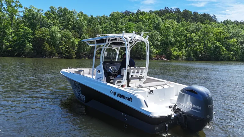 Slide: The Image of 2020 Wellcraft Scarab Offshore boat on a calm river. - 22