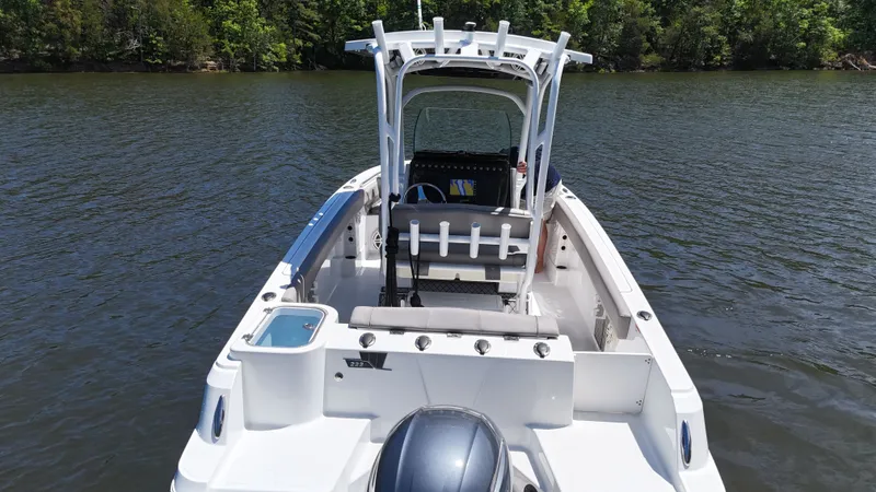 Slide: The Image of 2020 Wellcraft Scarab Offshore boat on calm water. - 23