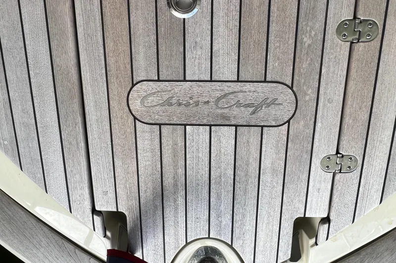 Slide: The Image of 2020 Chris-Craft Launch 31 GT teak deck with engraved logo. - 27