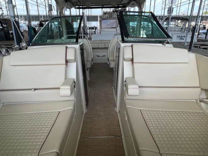 Slide: The Image of 2020 Chris-Craft Launch 31 GT interior with beige seating and open cockpit. - 43