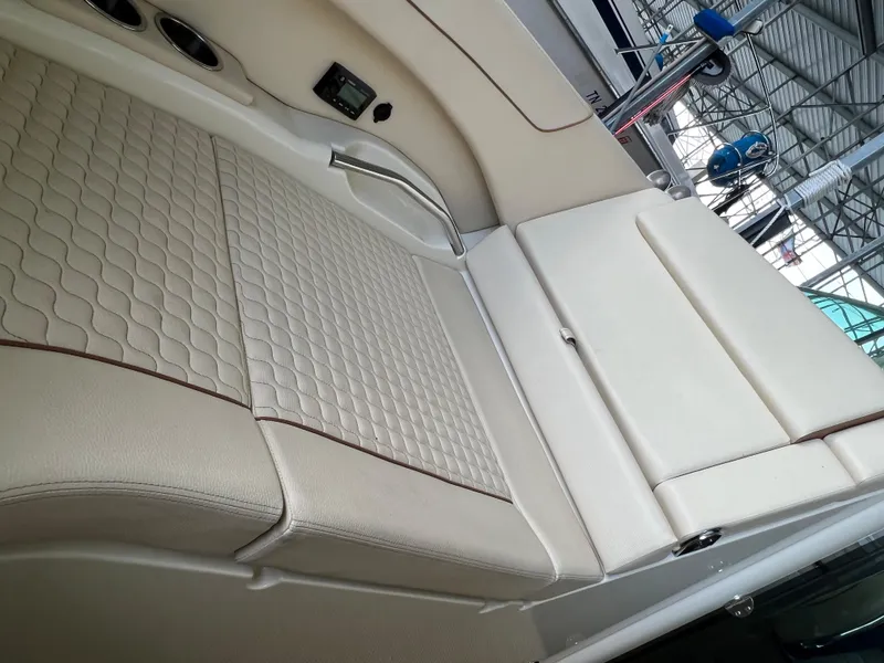 Slide: The Image of 2020 Chris-Craft Launch 31 GT boat interior with beige quilted seating. - 44
