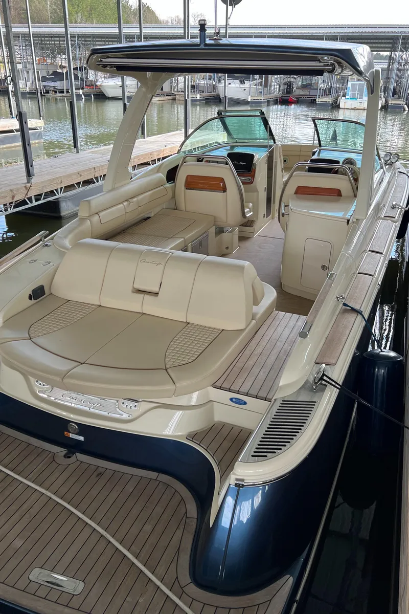Slide: The Image of 2020 Chris-Craft Launch 31 GT luxury boat with spacious seating and elegant design. - 8