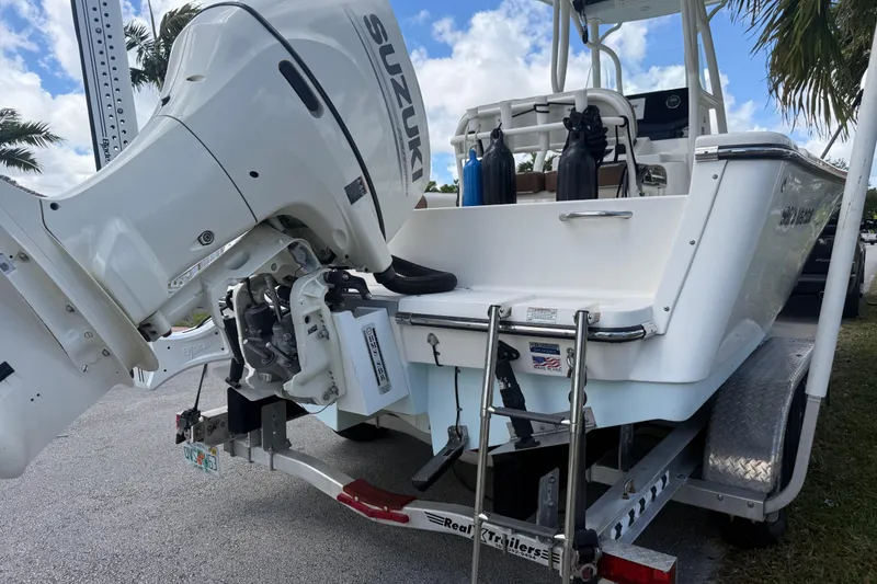 Slide: The Image of 2020 Sea Pro 210 Center Console boat with Suzuki outboard motor on trailer. - 33