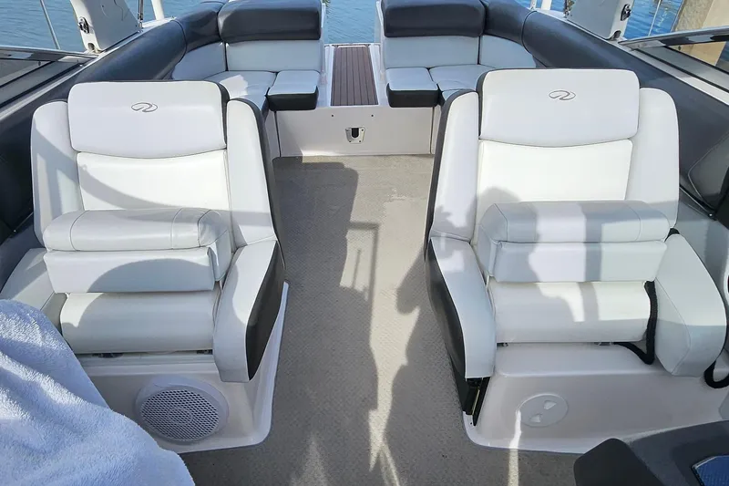 Slide: The Image of 2010 Regal 2700 ES Bowrider interior with plush seating and modern design. - 21