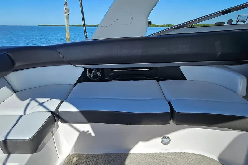 Slide: The Image of 2010 Regal 2700 ES Bowrider interior seating with ocean view. - 34