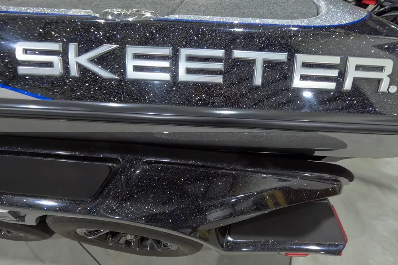 Slide: The Image of 2025 Skeeter boat with glittery black finish and bold logo. - 12