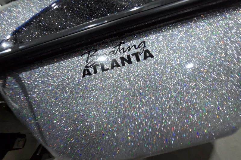 Slide: The Image of Glittering Skeeter boat with "Boating Atlanta" text, 2025 model. - 14