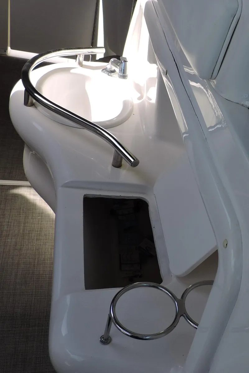 Slide: The Image of 2002 Sea Ray 310 Sundancer interior sink and counter detail. - 21