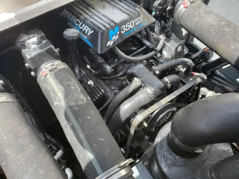 Slide: The Image of Engine compartment of 2002 Sea Ray 310 Sundancer with Mercury 350 MAG MPI engine. - 48