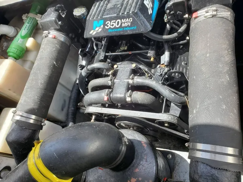 Slide: The Image of Engine of a 2002 Sea Ray 310 Sundancer with 350 MAG MPI motor. - 49