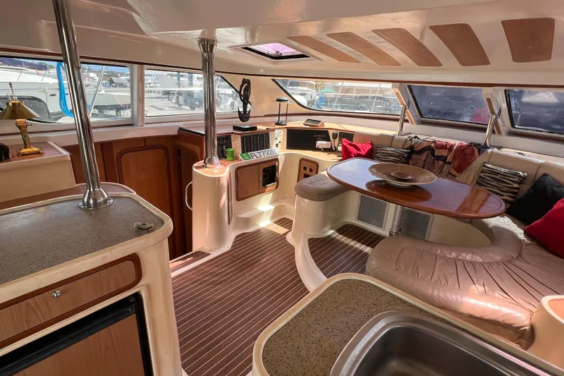 Slide: The Image of Luxurious interior of 2009 Africat Marine 420 yacht with elegant seating and wooden accents. - 17