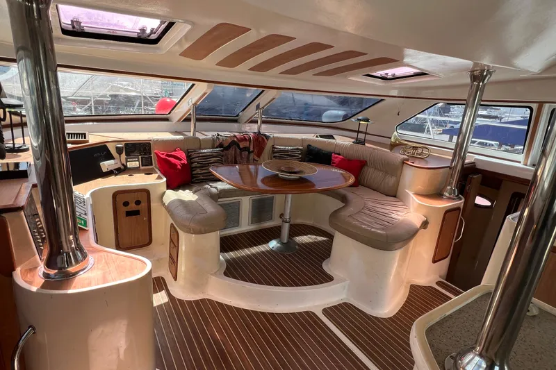Slide: The Image of Luxurious interior of 2009 Africat Marine 420 yacht with plush seating and elegant wood finishes. - 18