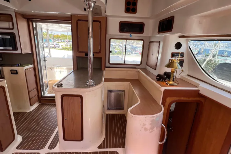 Slide: The Image of Interior of 2009 Africat Marine 420 yacht with wooden cabinetry and modern design. - 22