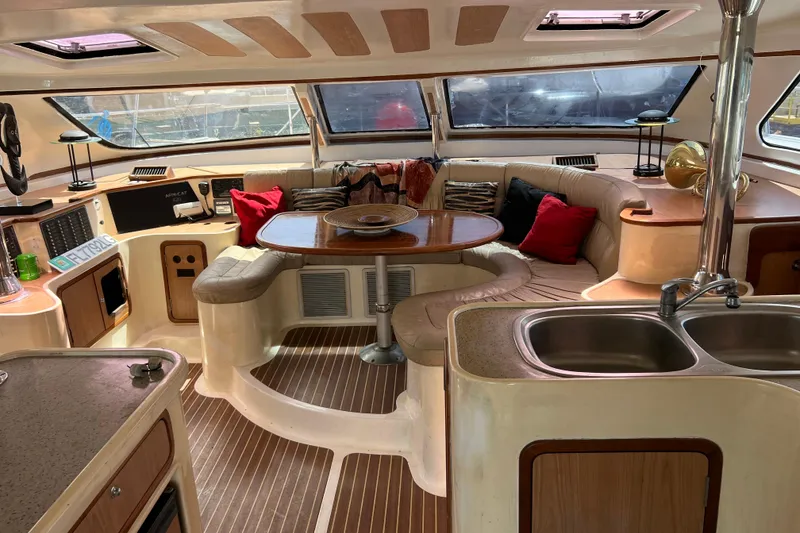 Slide: The Image of Luxurious 2009 Africat Marine 420 yacht interior with plush seating and elegant dining area. - 26