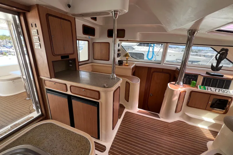 Slide: The Image of Interior of 2009 Africat Marine 420 yacht with wood cabinetry and modern amenities. - 34