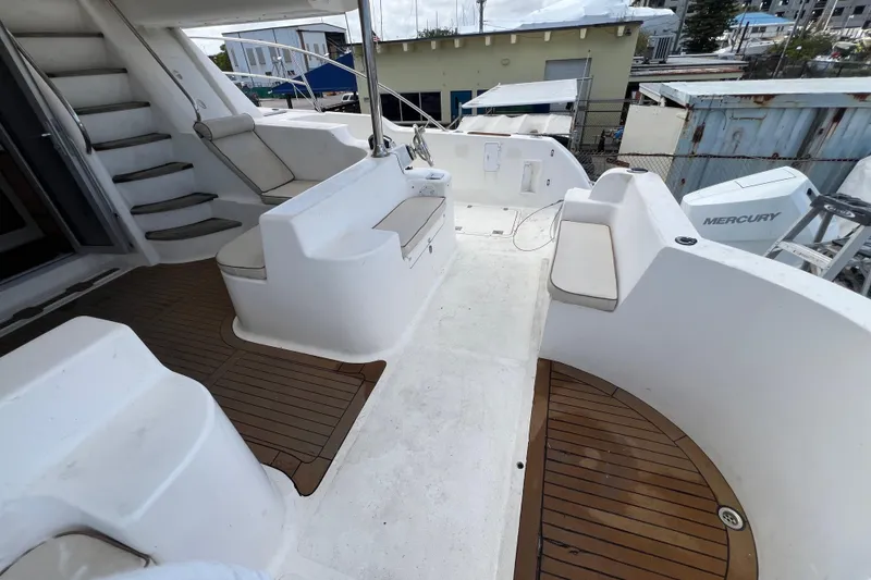 Slide: The Image of 2009 Africat Marine 420 yacht deck with seating and wooden flooring. - 40