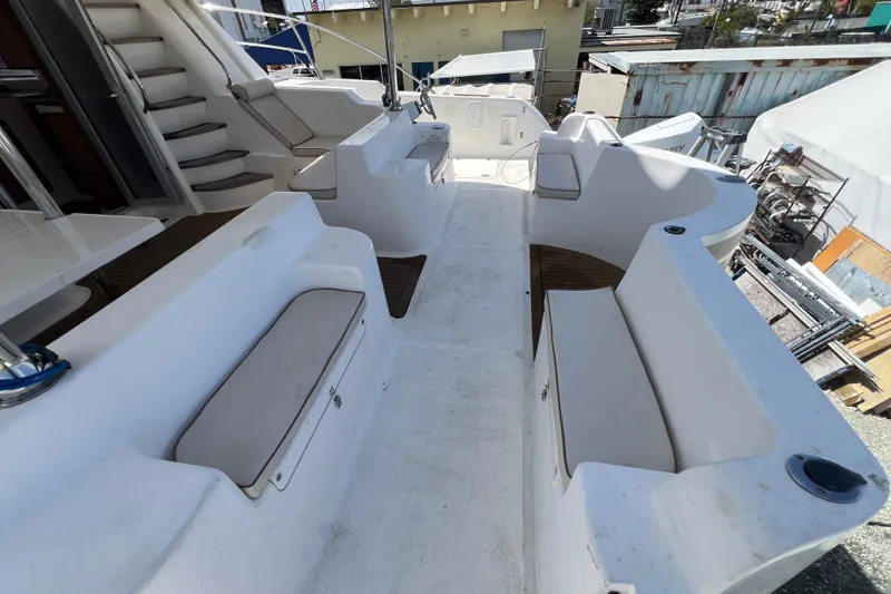 Slide: The Image of Spacious deck of 2009 Africat Marine 420 yacht with seating and stairs. - 62