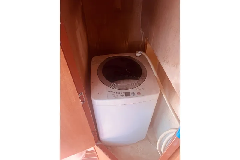 Slide: The Image of Compact washing machine inside Africat Marine 420 yacht, 2009 model. - 64