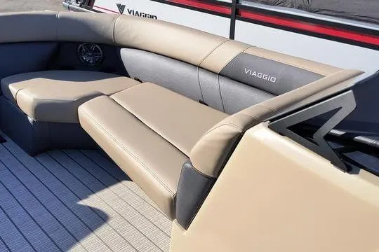 Slide: The Image of Luxurious seating on 2026 Viaggio V22U boat with beige upholstery. - 11