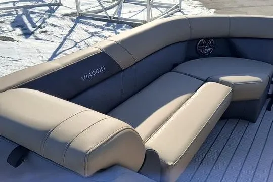Slide: The Image of Luxurious seating on 2026 Viaggio V22U boat, featuring elegant beige upholstery and modern design. - 9