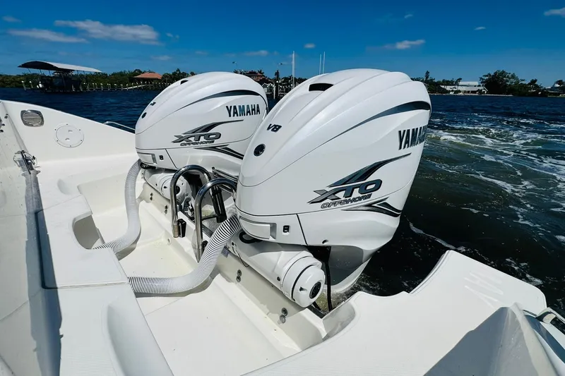 Slide: The Image of 2021 Pursuit OS 355 Offshore boat with twin Yamaha XTO Offshore engines. - 15