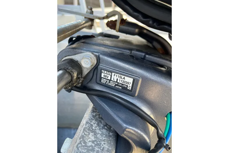 Slide: The Image of Close-up of Yamaha F115LA motor on 2012 Bennington 22 SSI boat. - 4