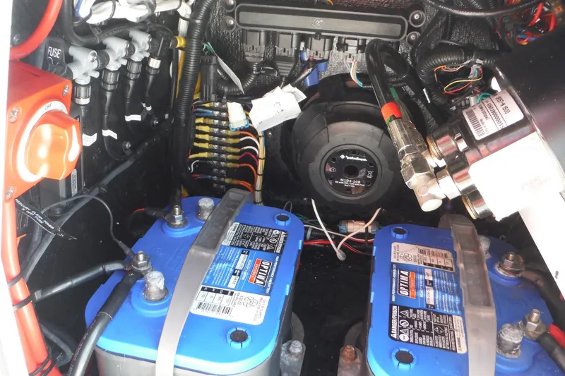 Slide: The Image of Covered 2023 Lake & Bay 21 Boca Grande boat docked by the water. - 10