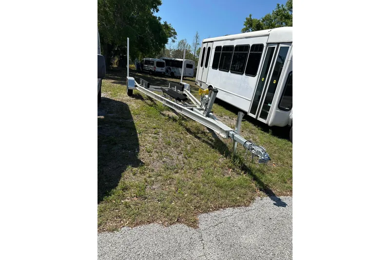 Slide: The Image of Open storage compartment in 2023 Lake & Bay 21 Boca Grande boat. - 21