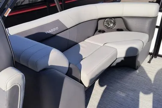 Slide: The Image of Luxurious seating on 2026 Viaggio Lago V22U pontoon boat with sleek gray upholstery. - 12