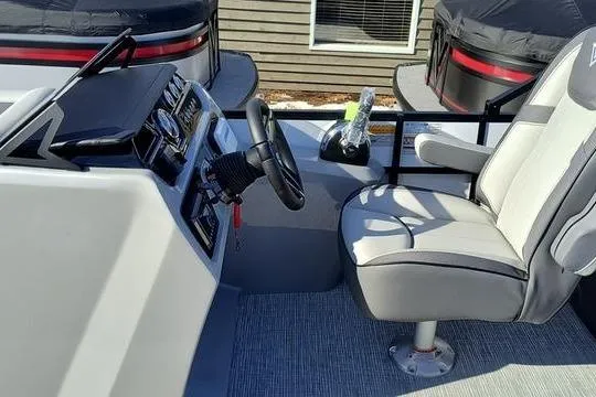 Slide: The Image of Captain's seat and controls of 2026 Viaggio Lago V22U boat. - 4