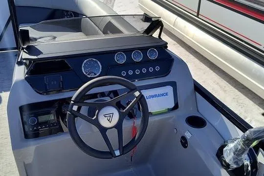 Slide: The Image of Cockpit of 2026 Viaggio Lago V22U boat with steering wheel and control panel. - 5