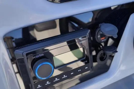 Slide: The Image of Control panel of 2026 Viaggio Lago V22U with Clarion audio system and DC outlets. - 6