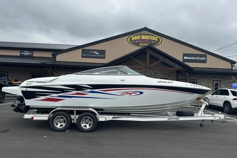 The Image of Custom 2006 245 Boss boat on trailer at Boat Masters Marine dealership. - 0