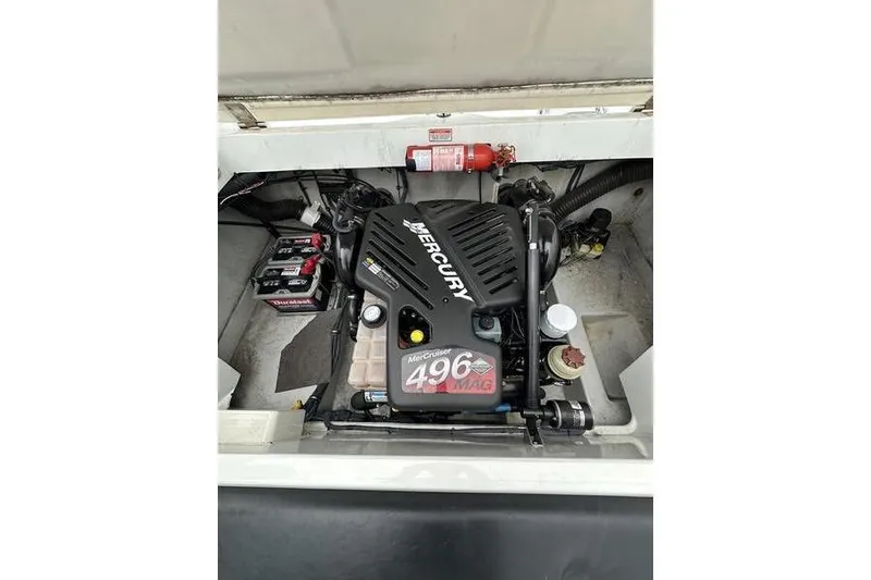 Slide: The Image of Engine compartment of a 2006 Custom 245 Boss with MerCruiser 496 MAG engine. - 23