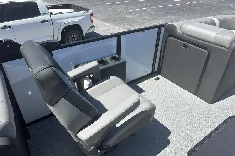 Slide: The Image of Interior of 2026 Evotti 523QL boat with seating and cup holders. - 10