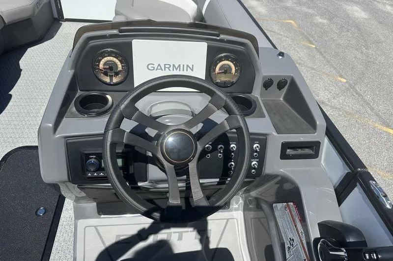Slide: The Image of Steering console of 2026 Evotti 523QL boat with Garmin navigation system. - 11