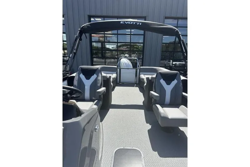 Slide: The Image of 2026 Evotti 523QL boat interior with modern seating and canopy. - 15