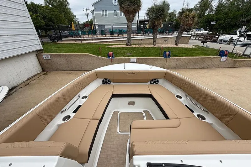 Slide: The Image of 2026 Sea Ray SDX 270 Outboard boat with spacious tan seating and modern design. - 28