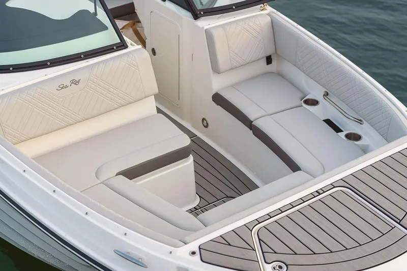 Slide: The Image of 2026 Sea Ray SDX 270 Outboard boat on display outside a storage facility. - 3