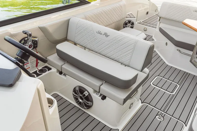 Slide: The Image of 2026 Sea Ray SDX 270 Outboard boat with tan seating and sleek design. - 6