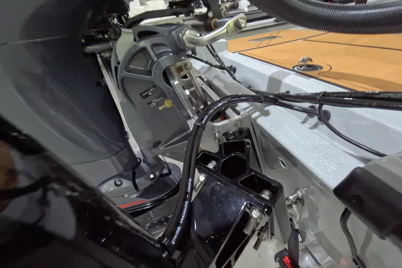 Slide: The Image of Close-up of the 2025 Avid 18 Rogue CC boat's engine and mechanical components. - 11