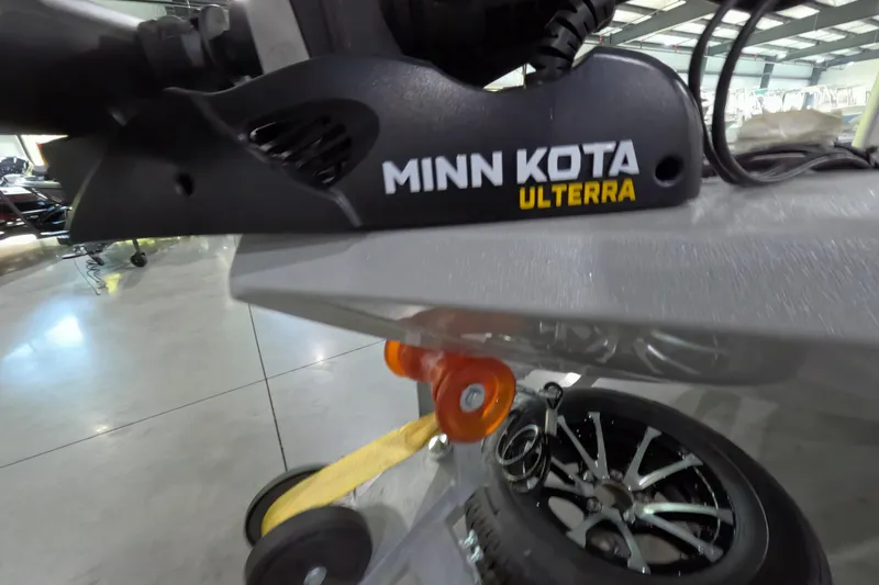 Slide: The Image of Minn Kota Ulterra motor on 2025 Avid 18 Rogue CC boat in showroom. - 5