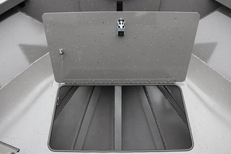 Slide: The Image of Open storage compartment in 2026 Alumaweld Intruder 22 boat. - 23
