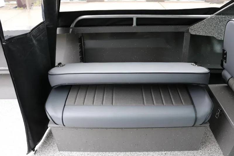 Slide: The Image of 2026 Alumaweld Intruder 22 boat interior with gray cushioned seating and sleek design. - 9