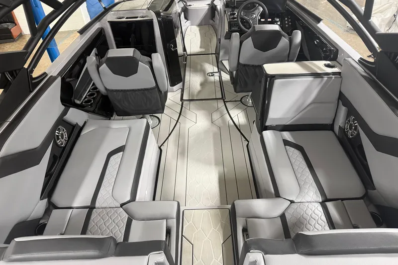 Slide: The Image of 2026 Yamaha Boats 255XD interior with modern seating and sleek design. - 3